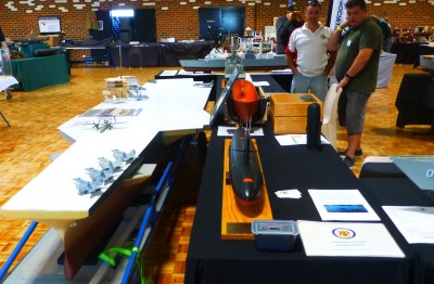 Taskforce 72 Exhibition stand with Constellation, USS Scorpion and hull of Endurance