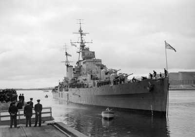 The_cruiser HMS PHOEBE with HM King George VI and HM Queen Elizabeth.jpg