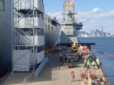 Bridge section being lifted from the wharf