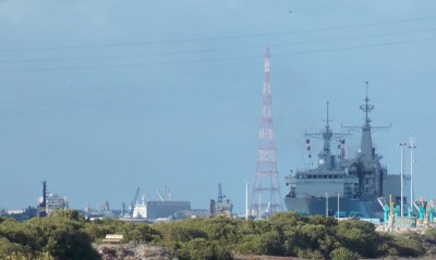 Two of Port Adelaide's tugs standby to assist her