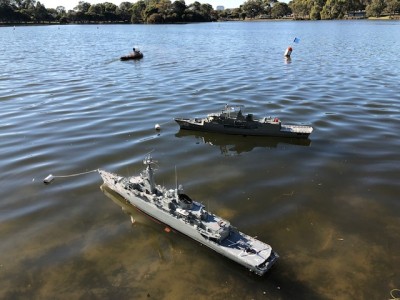 HMS Ardent and HMAS Toowoomba at their buoys.