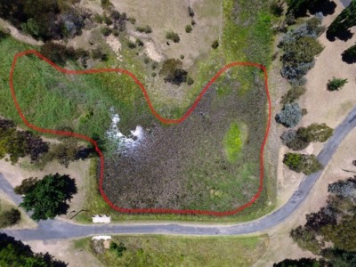 The drone photo of the area.   The channel heads off to the top right of the photo and goes for around 50m and is around 5m wide.   You can see the possible island(s) in the photo in light green.